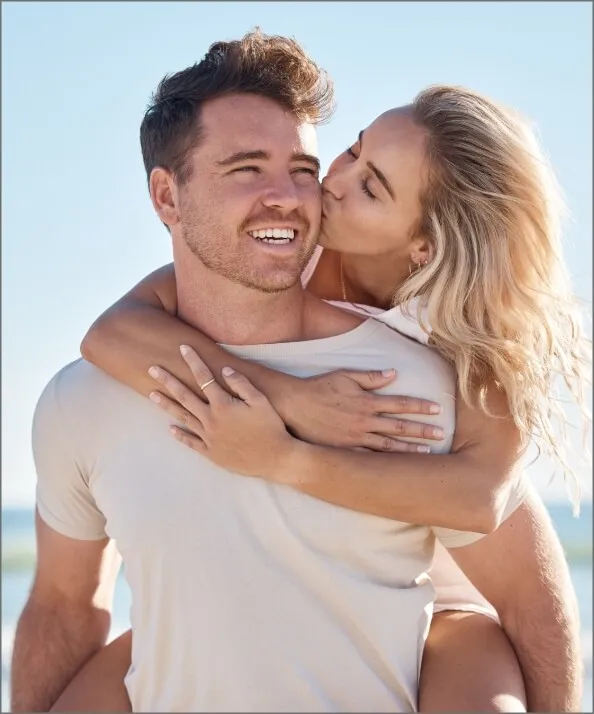 beach-love-hug-and-couple-kiss-on-romantic-date-2023-11-27-04-59-28-utc